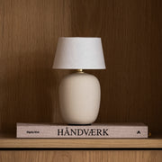 Audo Copenhagen Stolní lampa Torso Portable, Sand - DESIGNSPOT